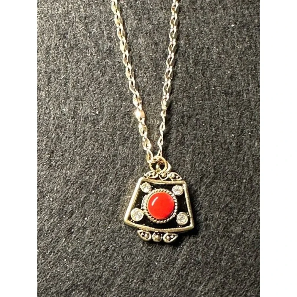 ESPRIT Gold Tone Necklace Black Shield Pendant Red Cabochon Rhinestone Accent